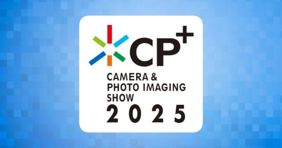 Logo for the CP+ Camera & Photo Imaging Show 2025. It features a white square with "CP+" in large text and "CAMERA & PHOTO IMAGING SHOW" and "2025" below, all on a blue pixelated background.