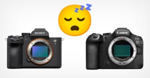 Two mirrorless camera bodies, one Sony and one Canon, are shown with their lens mounts exposed. A large sleeping face emoji with "Zzz" is placed above and between them, suggesting boredom or indifference.