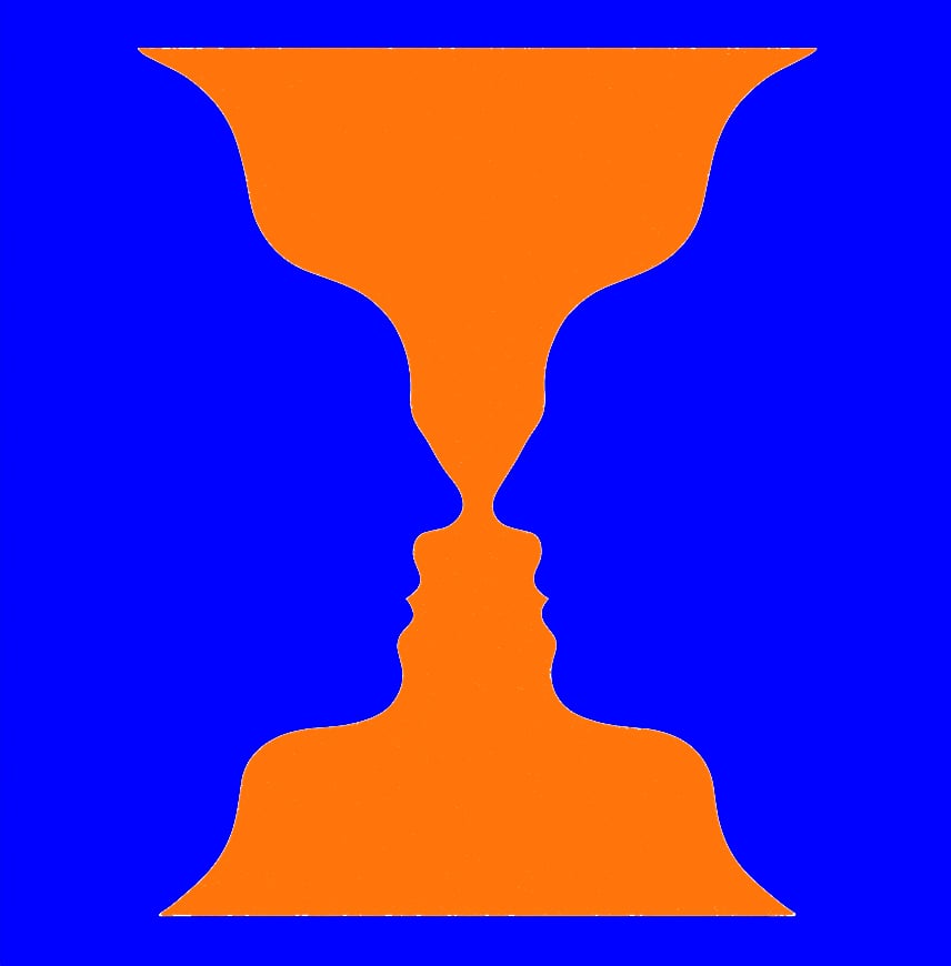 An optical illusion with a blue background shows two orange profiles facing each other, creating the shape of a cup or vase in the negative space between them.