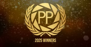 Gold laurel wreath around geometric design with the letters "PP" in the center, above the text "2025 WINNERS," on a sparkling, festive background.